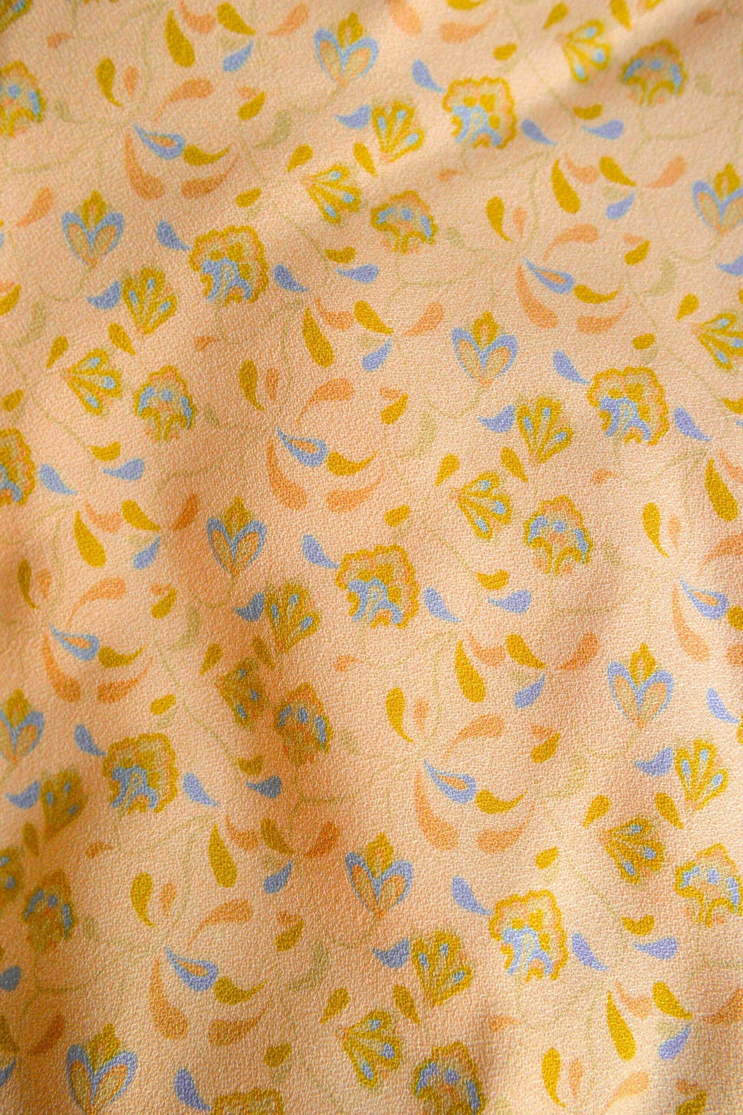 Héméra - Peach wrap skirt with yellow and blue flowers